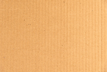 Fototapeta na wymiar Cardboard paper yellowish background - template from packaging cardboard made from recycled materials