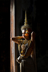 An Asian woman wearing a traditional costume for Ramya is hidden at the door. Suvannamaccha is a...