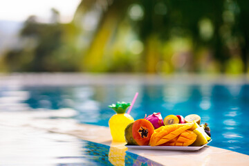 Tropical fruit at swimming pool