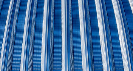 The surface of a industrial metal roof. Abstract background
