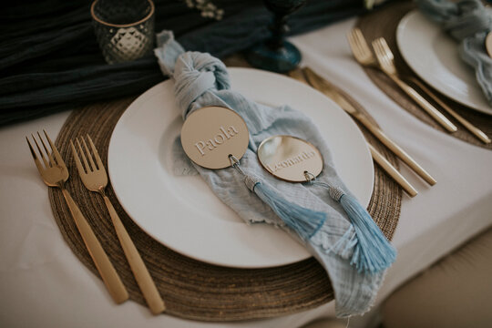 baby blue and gold table setting at a baby party, baby shower, gender reveal party