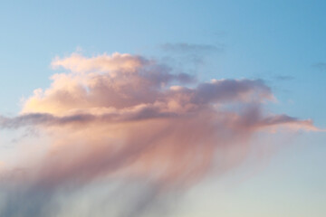 beautiful evening sky with rainy clouds and sunset light
