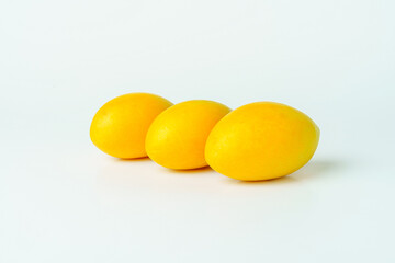 Group of yellow Marian plum on white background. Isolated of Marian plum fruit.