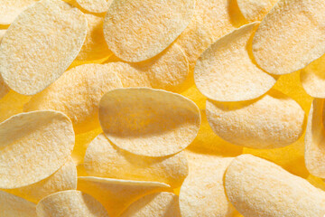 Crispy original potato chips background