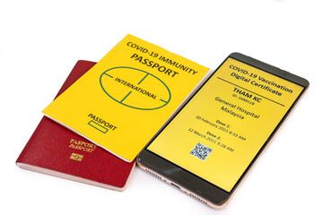 Concept of Covid-19 Immunity Passport for international travel, and digital certificte of vaccination on smart phone.