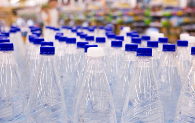 Clear clear bottles are collected in a container for the production of clean water