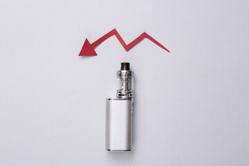 Drop arrow and vaping device on gray background