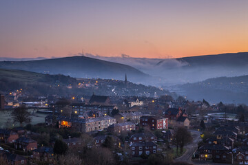 Sunrise over Mossley with the mist rolling in from the Chew Valley