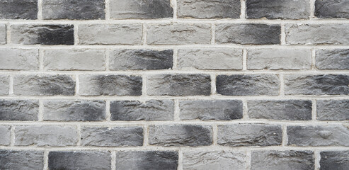 Simple hand made black and white brick wall