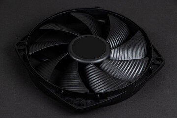 Computer fan on a black background close up