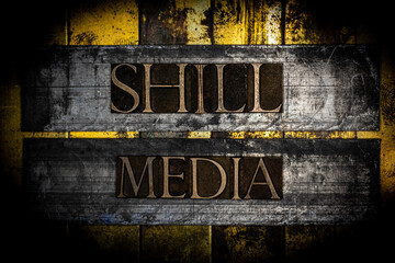 Shill Media text with on vintage textured silver grunge copper and gold background