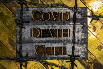 Covid Death Cult text on vintage textured grunge copper and gold background