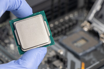 Plug in CPU microprocessor to motherboard socket. Technological background. Concept computers...