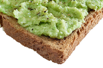Brown cereal bread toast with salted and peppered avocado paste  isolated