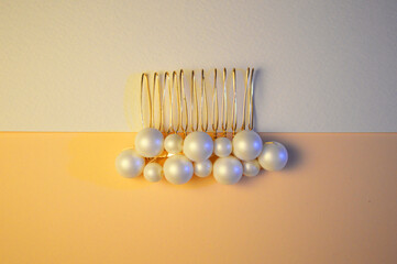 beautiful brooch in gold color with pearls