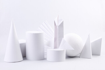 Startup or space flight. Origami rocket space shuttle and geometric shapes on a white background. Minimalism. Concept art