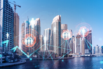 Skyscrapers of Dubai business downtown. International hub of trading and financial services. Social...