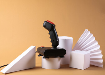 Retro joystick and geometric shapes on a beige background. Concept art. Retro 80s © splitov27