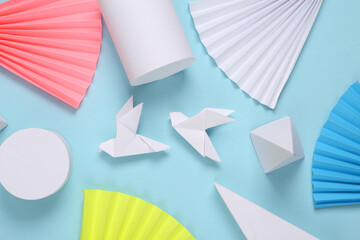 Origami birds on abstract background with geometric shapes. Minimalism. Concept art. Creative layout