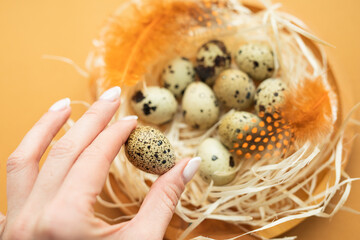 Basket with easter eggs on white background