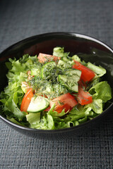 Salad of Frieze, tomatoes and cucumbers with olive oil.