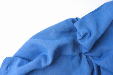 Blue fabric with wave smooth and soft on the table white background.