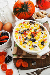 Pumpkin casserole with dried fruits - 422075193