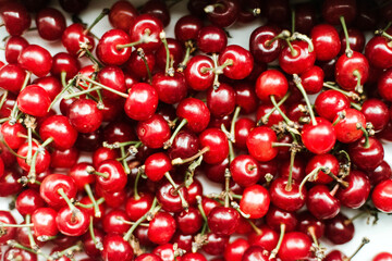 Cooking raw ingredients on white table, making cake.