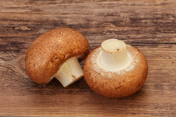 Raw Brown Champignons over background