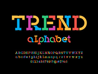 stencil style alphabet design with uppercase, lowercase, numbers and symbols