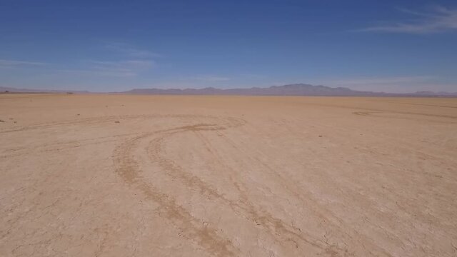 Aerial of a large dry lake in the desert