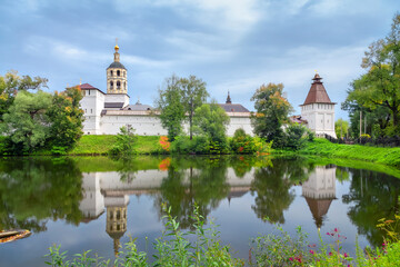 St. Paphnutius of Borovsk Monastery reflecting in water, Kaluga oblast, Russia