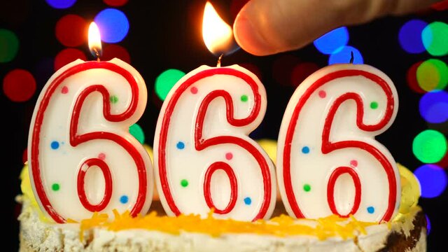 Number 666 Happy Birthday Cake With Burning Candles Topper.