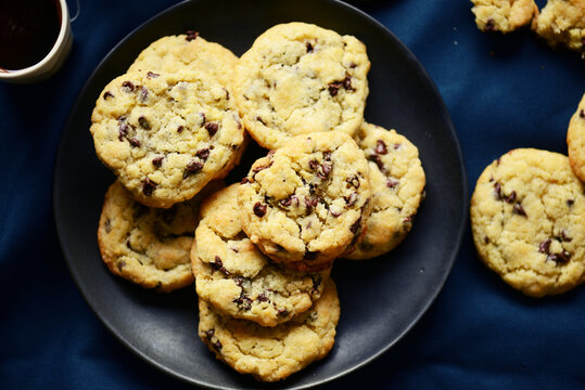 Delicious chocolate chips cookies on plate 