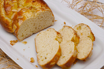 plaited yeast bun-pastry on vintage table