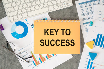 Key to success is written in a document on the office desk