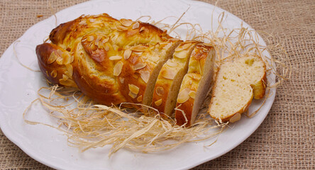 plaited yeast bun-pastry on burlap