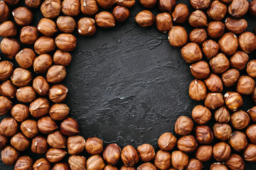 hazelnut background in black background