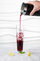 Making of coctail on white table