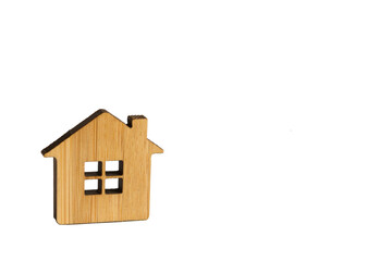 Wooden house on a white background isolated. Farm, new home, construction, relocation, real estate purchase, mortgage, rent. Keychain, pendant, model