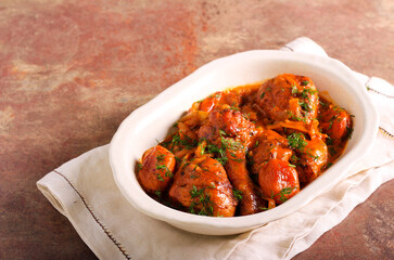 Spicy chicken drumsticks with apricot