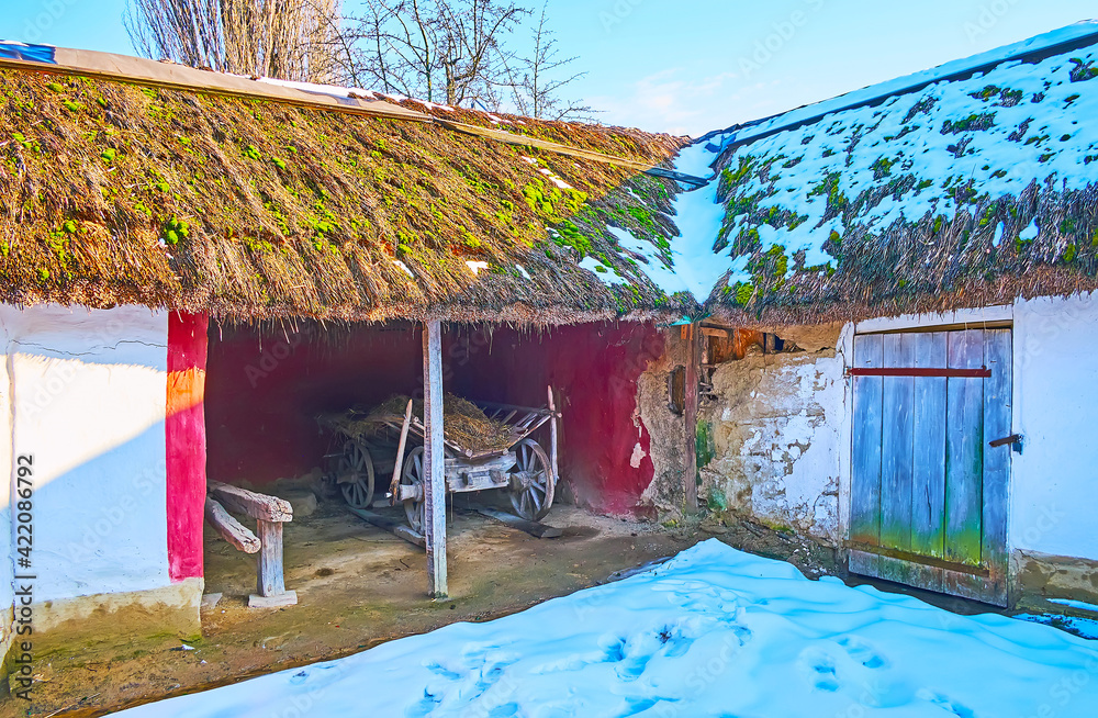 Wall mural The vintage wooden cart with hay, Pyrohiv Skansen, Kyiv, Ukraine