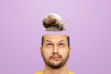 Slow brain concept, problems with head functions, alzheimer's. A man has a snail in his head instead of a brain.