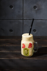 Non Alcoholic coctail on dark wood background