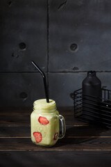 Non Alcoholic coctail on dark wood background