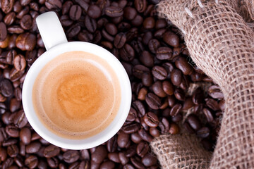 cup of coffee with beans