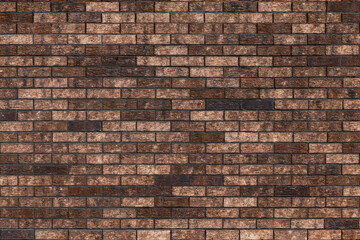 The surface of the wall is made of decorative clinker brick in brown color