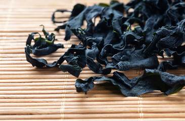 Dehydrated Sea mustard on white background，Undaria pinnatifida Suringar