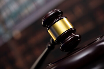 Law theme. Court library - gavel of the judge and books.