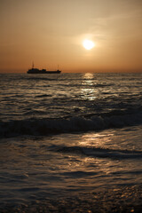 Fototapeta na wymiar Beautiful waves on the black sea. Sunset
